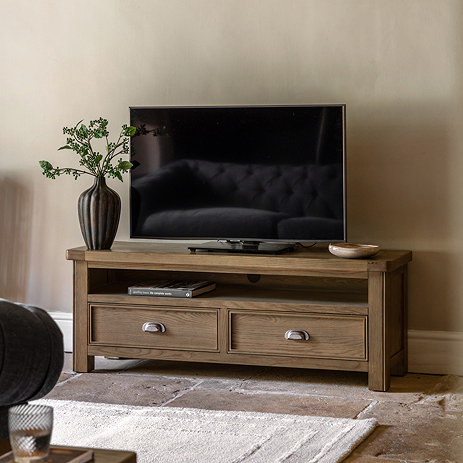 image of dark oak tv unit with two drawers and a shelf