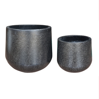 image cut out on white background of two rounded black cement pots, one slightly larger than the other