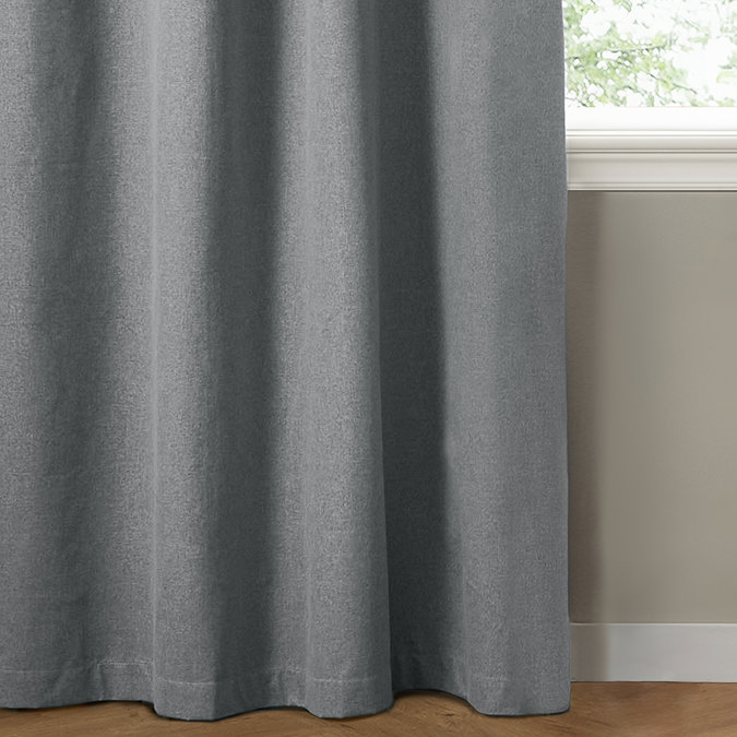 The Ultimate Blackout Eyelet Curtains in Denim over a window image