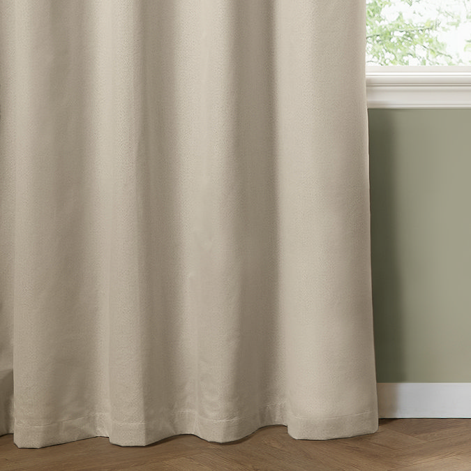 The Ultimate Blackout Eyelet Curtains in Ecru over a window image