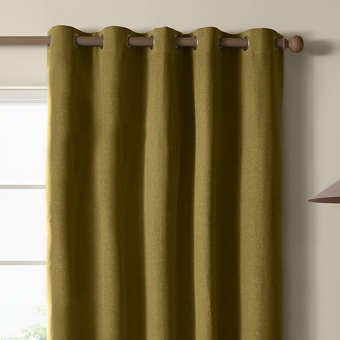 The Ultimate Blackout Eyelet Curtains in Forest over a window image