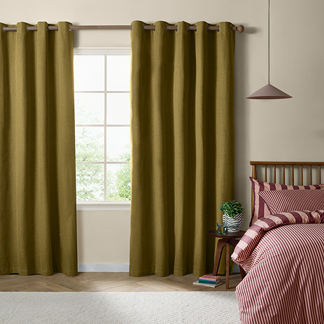 The Ultimate Blackout Eyelet Curtains in Forest over a window image