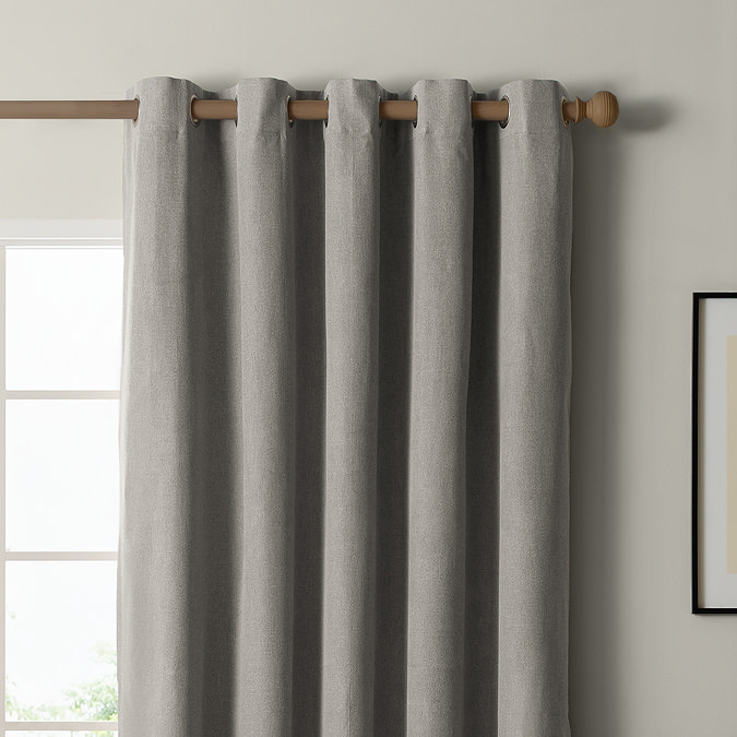 The Ultimate Blackout Eyelet Curtains in Grey over a window image