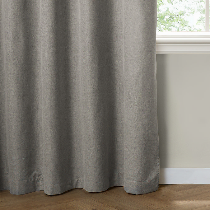 The Ultimate Blackout Eyelet Curtains in Grey over a window image