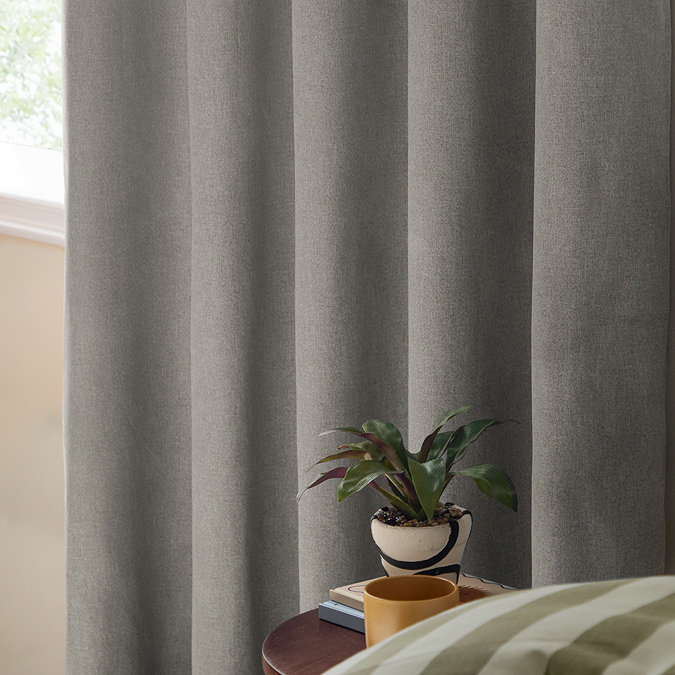 The Ultimate Blackout Eyelet Curtains in Grey over a window image