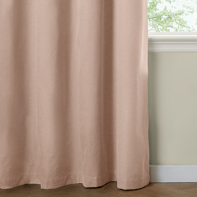 The Ultimate Blackout Eyelet Curtains in pink over a window image