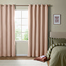 The Ultimate Blackout Eyelet Curtains in pink over a window image