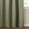 The Ultimate Blackout Eyelet Curtains in Sage over a window image