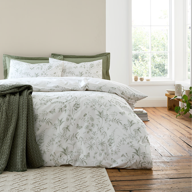 Thea floral duvet cover set in green on bed image 2