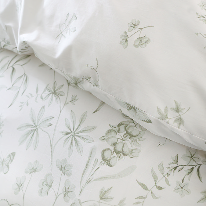 Thea floral duvet cover set in green on bed image 3