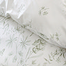 Thea floral duvet cover set in green on bed image 3