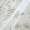 Thea floral duvet cover set in green on bed image 4