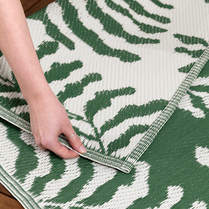 Tocorico outdoor rug in green and white on the floor image 5