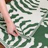 Tocorico outdoor rug in green and white on the floor image 5