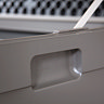close up image of moulded handle on dark grey plastic storage box
