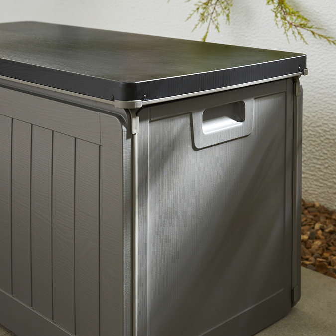 side on image close up on grey outdoor storage box, showing moulded handle and sleek panelled wood-effect front