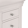 close up on top corner drawers of light grey dressing table
