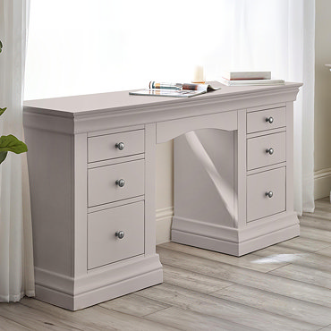 image of light grey dressing table with six drawers, the three on the left open to demonstrate storage space