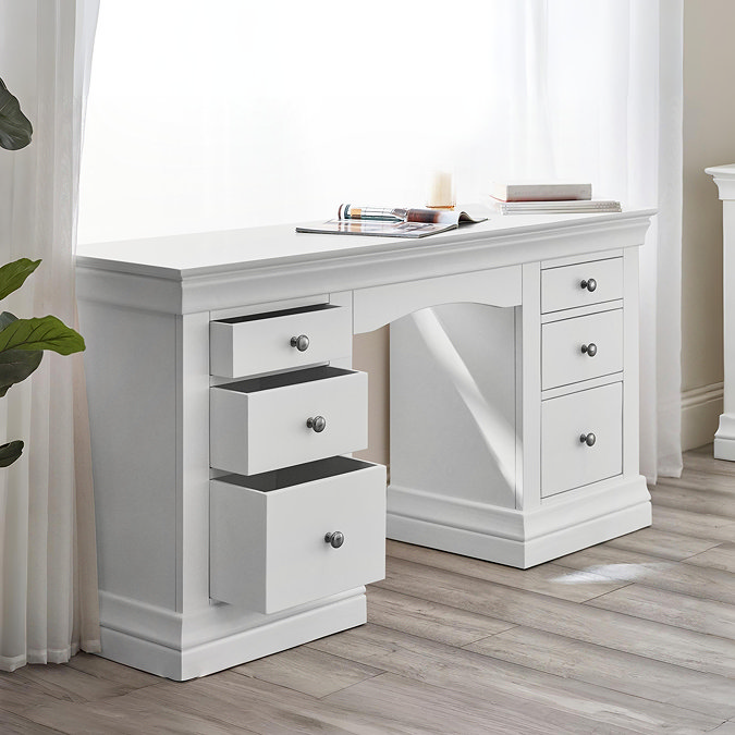 white pine dressing table with 3 drawers on each side, with the left three open to show drawer space