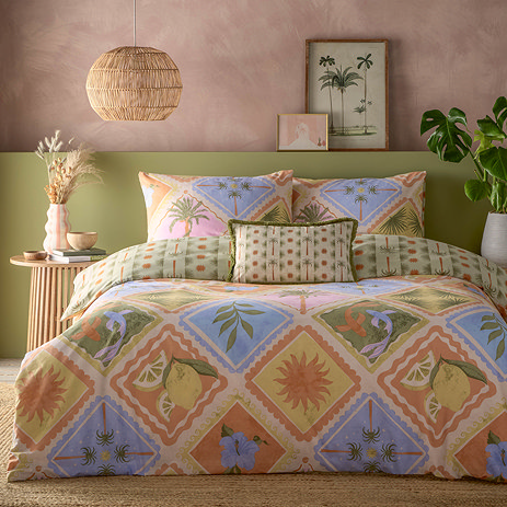 tropicala duvet cover set on bed image 1
