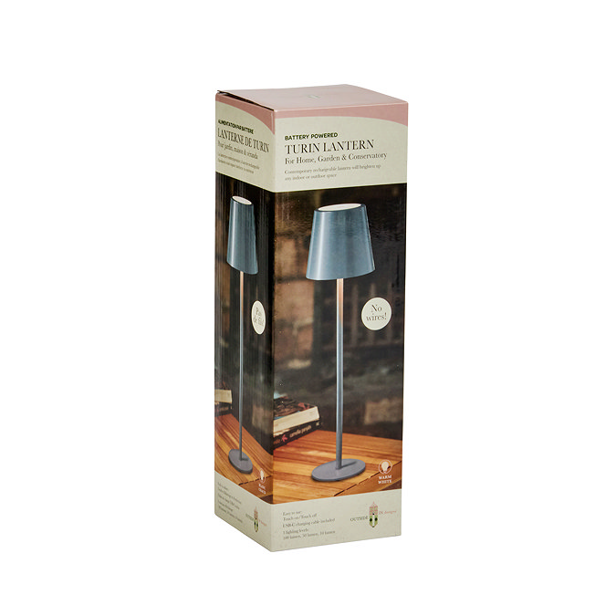 image cut out on white background of slate grey table lamp boxed up