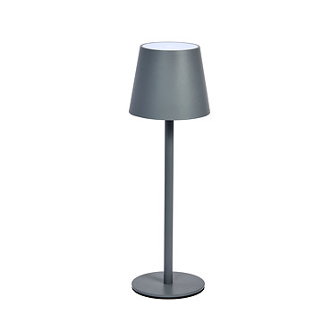 image of minimalist grey lamp on kitchen table emitting warm glow
