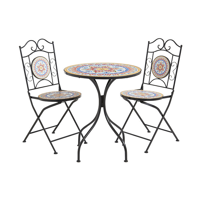 image cut out on white background of cast iron bistro set with colourful mosaic table and seats