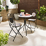 image of colourful cast iron bistro set on sunny patio