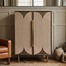 image of tall sideboard with 2 doors and central rope design, finished with gold handles and legs