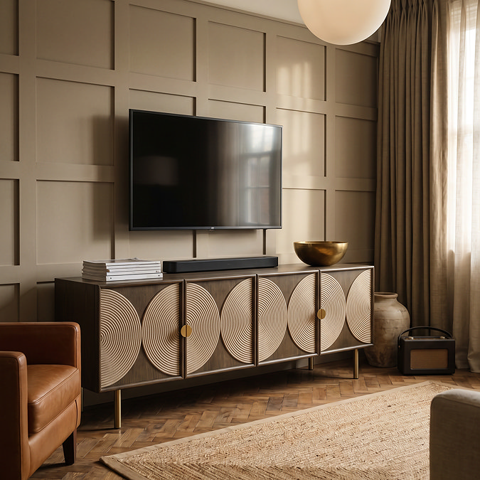 side on image of four door tv unit with central rope detail and brass legs