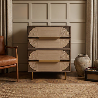 front on image of four drawer dark oak chest of drawers with gold legs and handles