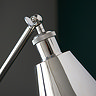 close up image of top of conical nickel shade of industrial-style floor lamp