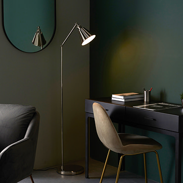 close up image of conical shade of nickel floor lamp with sleek, thin body