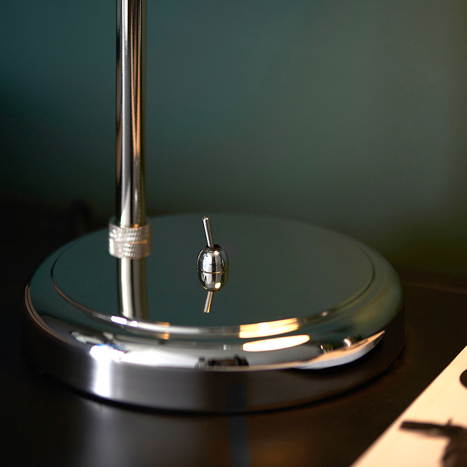 close up image of rounded base of modern table lamp in nickel colour