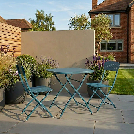image of caribbean blue steel bistro set on garden patio