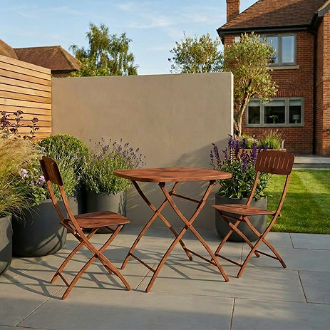 image of cayenne coloured steel bistro set on patio