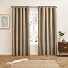 Verso Reversible Blackout Eyelet Curtains in Mocha over a window image