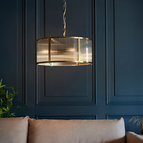 image of ribbed glass pendant light with antique brass metalwork
