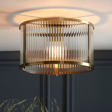 wider shot of ribbed glass ceiling light with antique brass