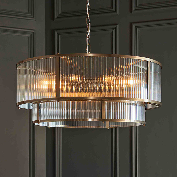 close up image of large two tiered ribbed glass pendant light