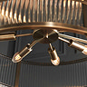 image taken from underneath looking up at bulb fixings within ribbed glass pendant light