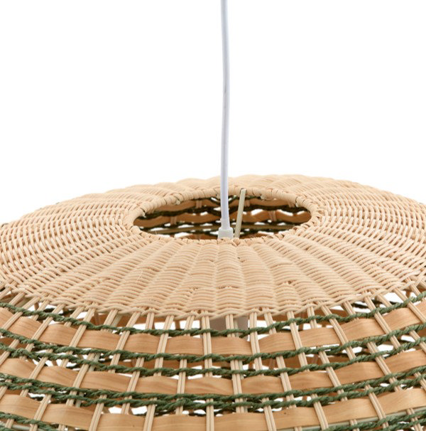 close up on top of woven rattan oval light shade in natural and green colours