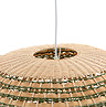 close up on top of woven rattan oval light shade in natural and green colours