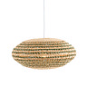 image cut out on white background of woven rattan hanging oval light shade in natural and green colours, with light bulb inside emitting a warm glow