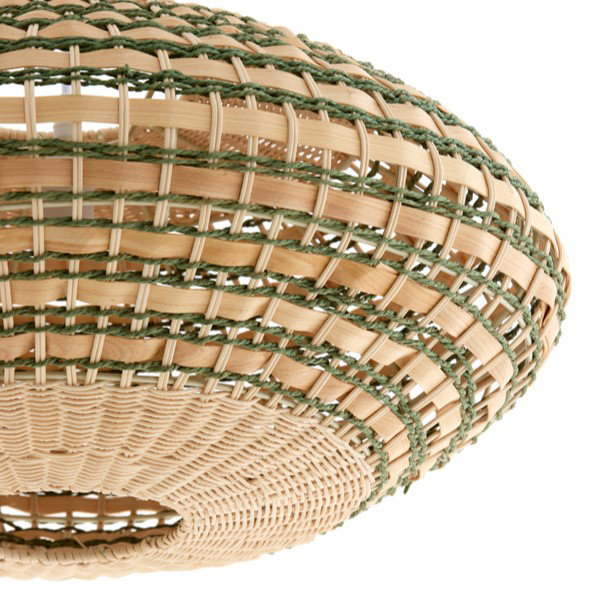 close up image cut out on white background of woven rattan hanging light, highlighting its texture and alternating natural and green detail