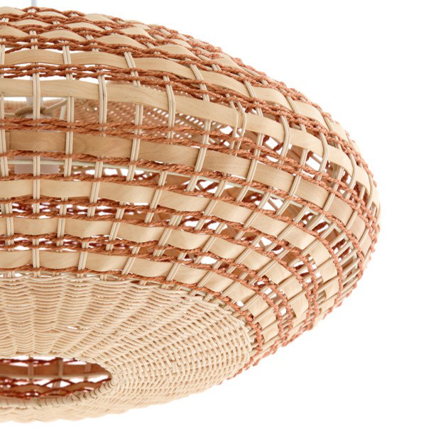 close up image of underside of woven oval light shade in natural and terracotta colours