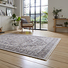 Vintage rug in grey on floor image 2