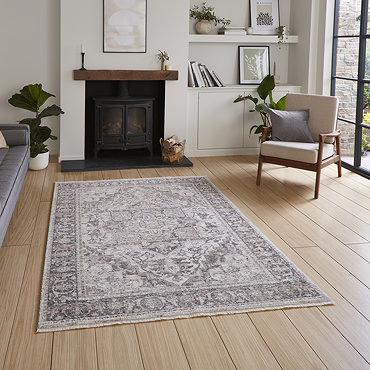 Vintage rug in grey on floor image 2