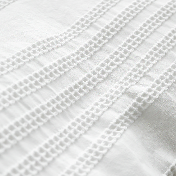 Waffle cotton stripe white close up on bed image 4