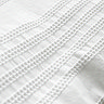 Waffle cotton stripe white close up on bed image 4